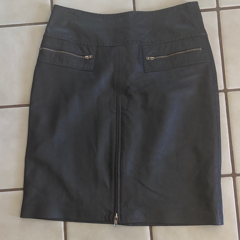 Cachet 100% leather skirt with zipper up the front and back! Super sexy!